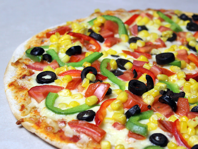 Opiniones de Santo Gusto - Pizza Delivery en Providencia - Pizzeria
