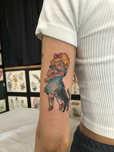 Explore upper arm tattoo ideas for guys, creative tattoo ideas in Libertyville, available at Lucky Seven Tattoo