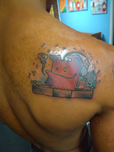 Tattoo Shop «Sacred Ink Tattoo», reviews and photos, 2707 E Court St, Flint, MI 48503, USA