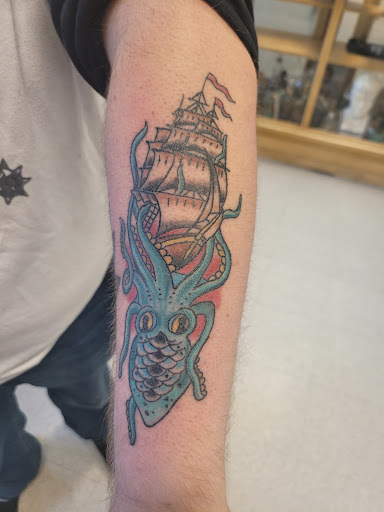 Explore rose cover up tattoo ideas, creative tattoo ideas in Ozark, available at Tooth & Nail Tattoo & Piercing