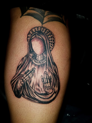 Explore predator tattoo ideas, creative tattoo ideas in Rogers, available at Ink Solutions Tattoo