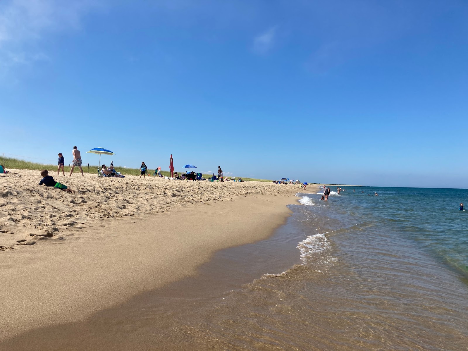 Foto von East Beach mit beiger sand Oberfläche