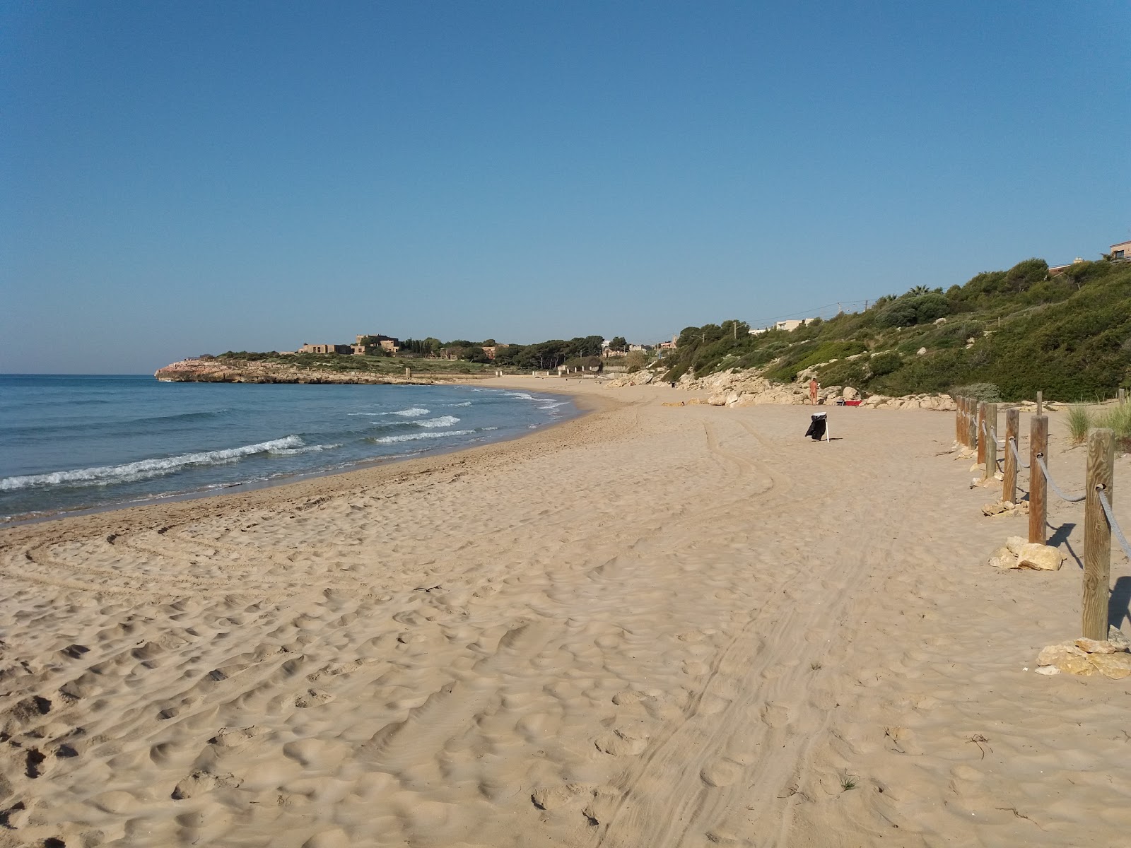 Foto de Praia de Savinosa com pequena baía