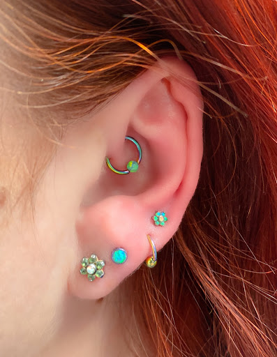 Explore tattoos tramp stamp ideas, creative tattoo ideas in Springfield, available at Body Piercing By Qui Qui