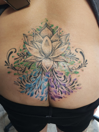 Explore hand mens tattoo ideas, creative tattoo ideas in Onalaska, available at Rock Bottom Tattoo Studio