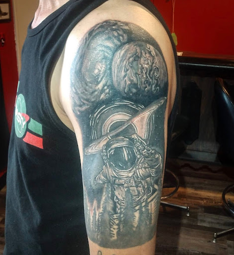 Explore small elephant tattoo ideas, creative tattoo ideas in Lander, available at Blackblood Tattoo and Piercing