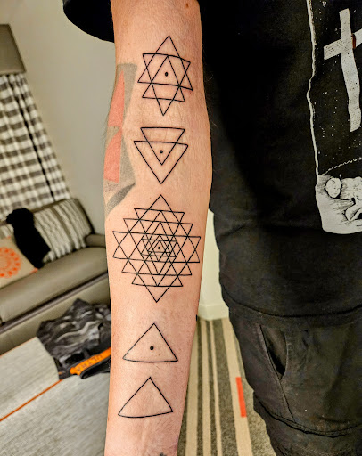 Explore tattoo ideas with your child's name, creative tattoo ideas in Orlando, available at Hart & Huntington Tattoo Co. Orlando