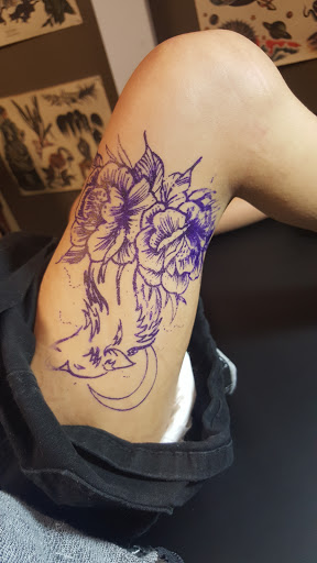 Explore women back tattoo ideas, creative tattoo ideas in Austin, available at Platinum Ink Tattoo & Body Piercing