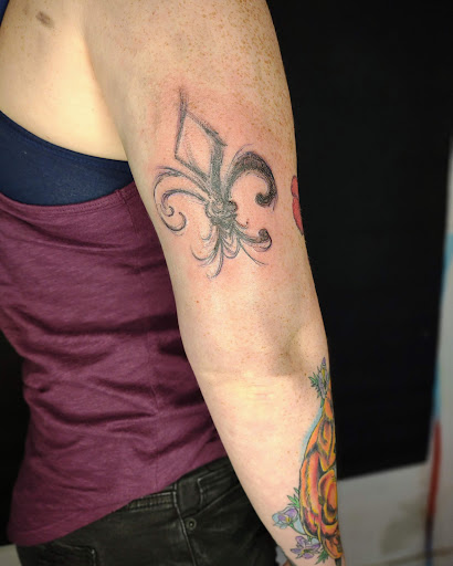 Explore dark themed tattoo ideas, creative tattoo ideas in New Orleans, available at Catahoula Tattoo 