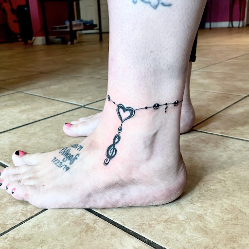 Explore dog paw print tattoo ideas, creative tattoo ideas in Berwick, available at Truth Custom Tattoo, Design & Gallery