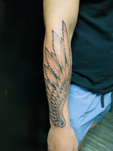 Explore cross tattoo ideas forearm, creative tattoo ideas in Jonesboro, available at Immortal Ink