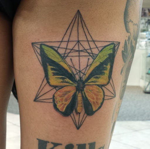 Find male tattoo ideas shoulder for your next unique tattoo in San Diego at Sideshow Tattoo and Piercing