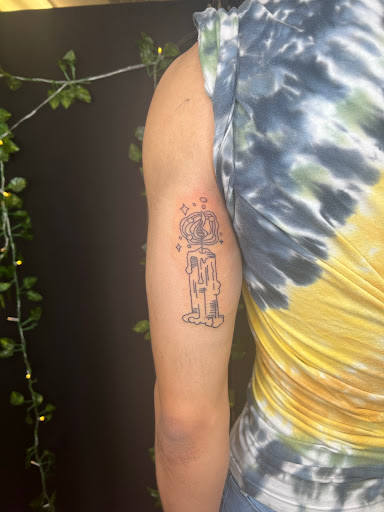 Explore tattoo ideas for football, creative tattoo ideas in Harrisonburg, available at Liberty Street Tattoos