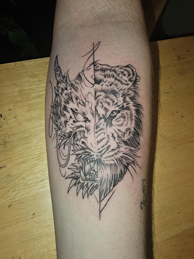 Explore beautiful flower tattoo ideas, creative tattoo ideas in Green Bay, available at SPITFIRE CREATIONS