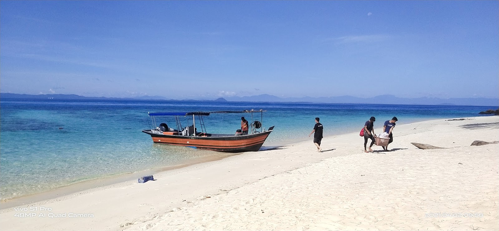 Foto van Bidong Bay met helder zand oppervlakte
