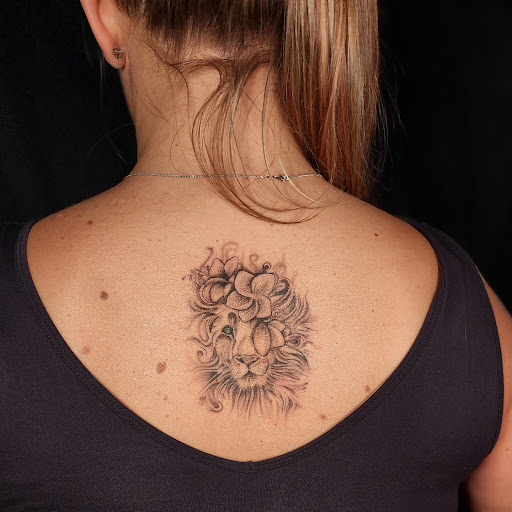 Explore small snake tattoo ideas, creative tattoo ideas in Minocqua, available at Whisky Rose Tattoo Parlor