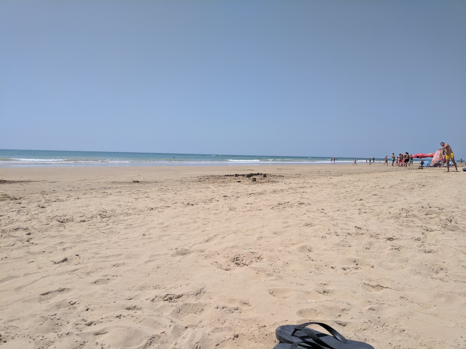 Photo de Playa de las Tres Piedras avec un rivage spacieux