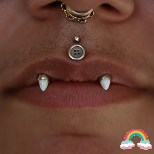 Explore flower spine tattoo ideas, creative tattoo ideas in Corona Del Mar, available at Rainbow Piercing & Jewelry