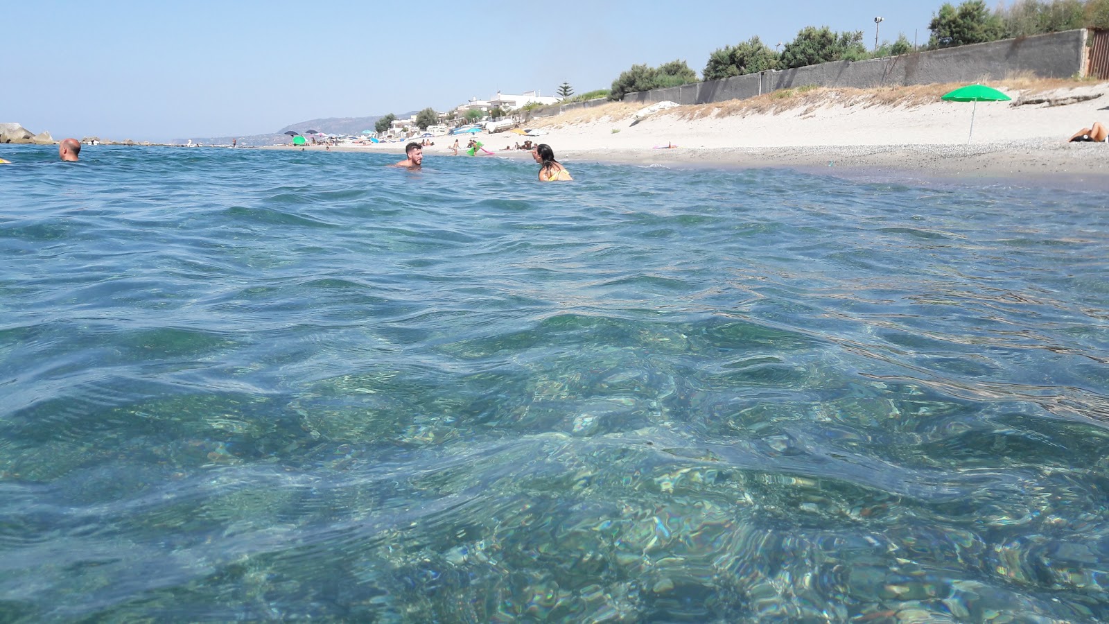 Valokuva Rometta Marea beachista. - suosittu paikka rentoutumisen tuntijoille