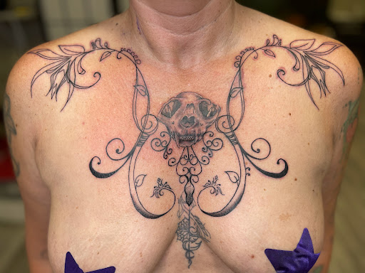 Explore snake tattoo ideas for guys, creative tattoo ideas in Watford City, available at Soulful Ink Studios