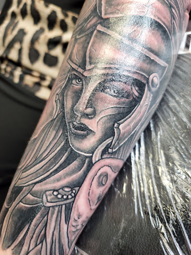 Find playboy bunny tattoo ideas for your next unique tattoo in Clarksville at Love Blood Ink Tattoo