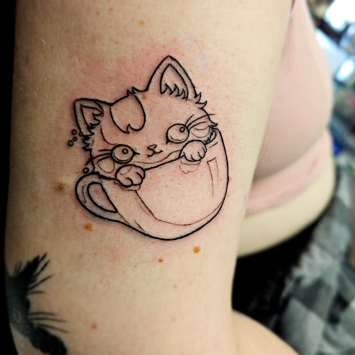 Explore surreal tattoo ideas, creative tattoo ideas in Traverse City, available at Pinups & Needles