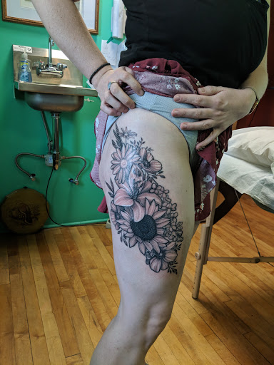 Explore upper arm tattoo ideas for women, creative tattoo ideas in Albany, available at Dead Presidents Lounge