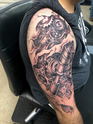 Explore beatles tattoo ideas, creative tattoo ideas in Cranston, available at Kabloom Tattoo Studio