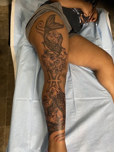 Explore flower shoulder tattoo ideas, creative tattoo ideas in Albany, available at Tat Jones Ruthless Tattoos L.L.C.