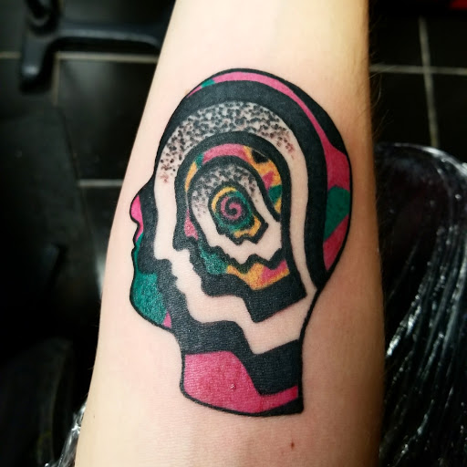 Explore neck tattoo ideas for women, creative tattoo ideas in Erie, available at EliKingInk