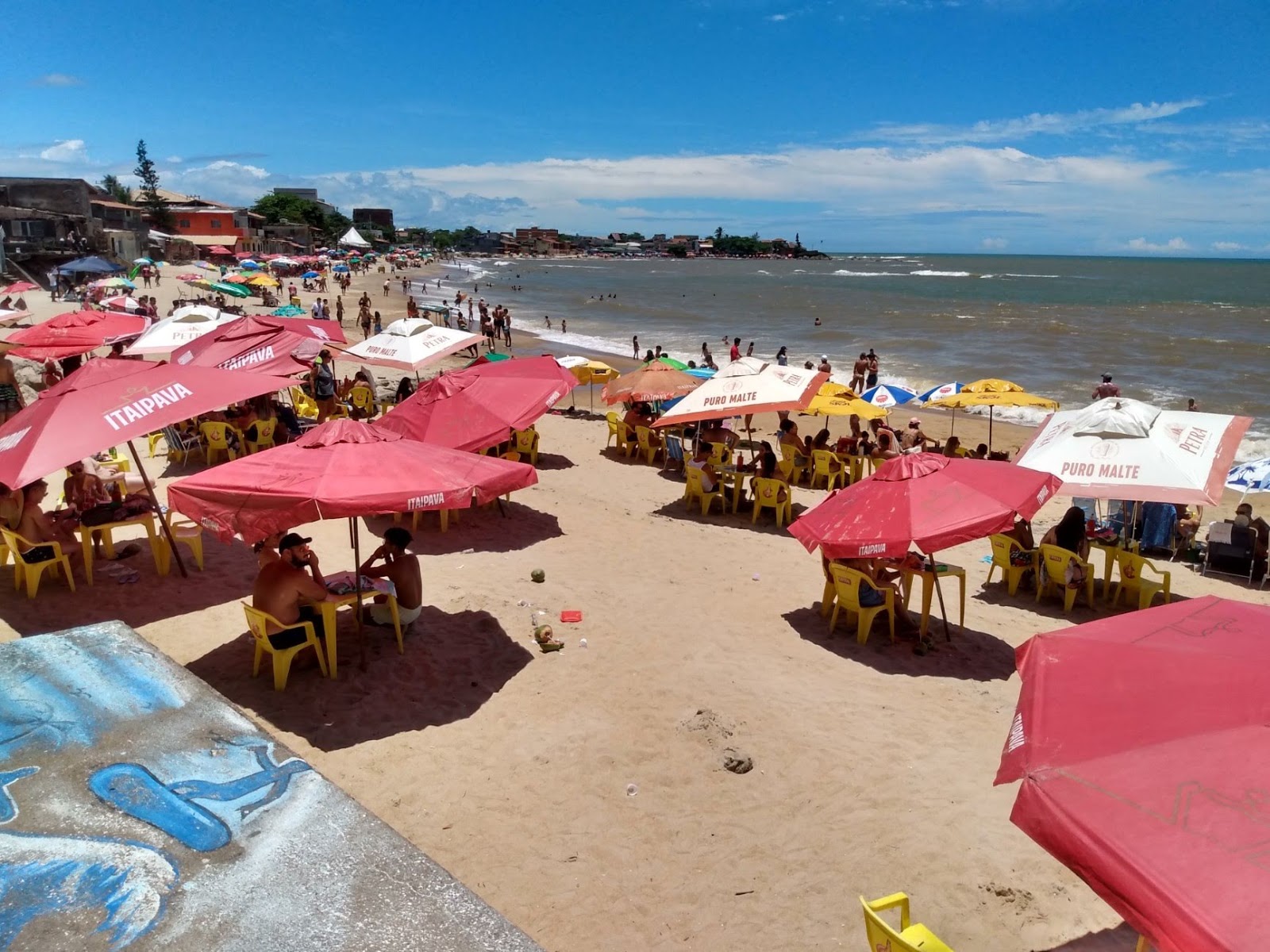 Foto von Strand von Colonia mit türkisfarbenes wasser Oberfläche
