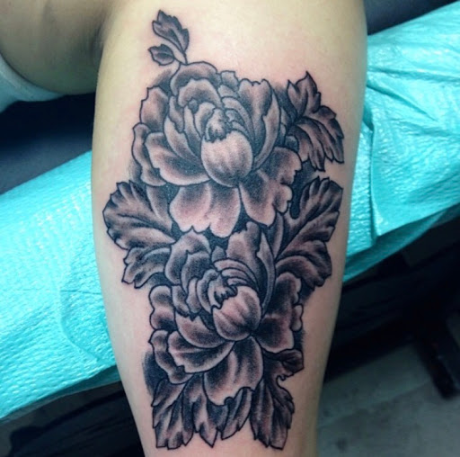 Explore angel chest tattoo ideas, creative tattoo ideas in Cedar Falls, available at Omega Red Piercing & Tattoo