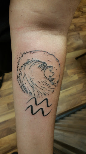 Explore evangelion tattoo ideas, creative tattoo ideas in Foley, available at Black Sheep Custom Tattoos and Piercings