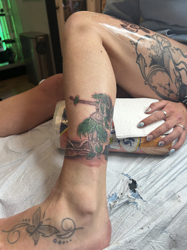 Explore tattoo ideas skull and roses, creative tattoo ideas in Honolulu, available at Aloha Tattoo Waikiki Hilton Hawaiian Village Rainbow Bazaar