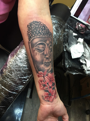 Explore tattoo for son ideas, creative tattoo ideas in Warner Robins, available at Untold Pain Tattoo Studio