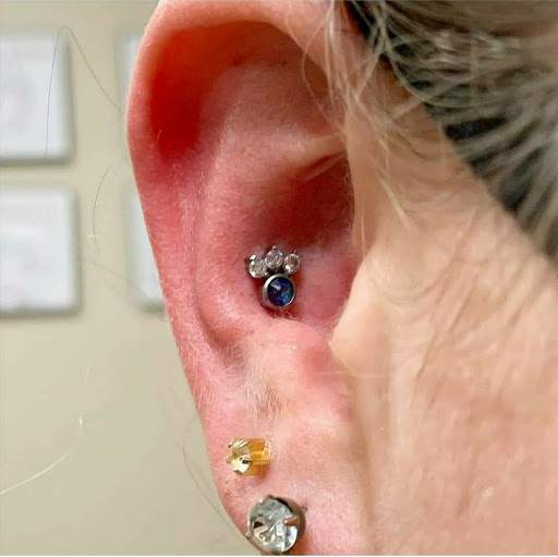 Explore cleavage tattoo ideas, creative tattoo ideas in Summerville, available at Exotic Impressions Body Piercing