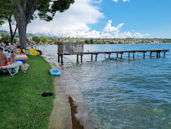 Lido Mirabello Beach'in fotoğrafı geniş bir kıyı şeridi ile birlikte