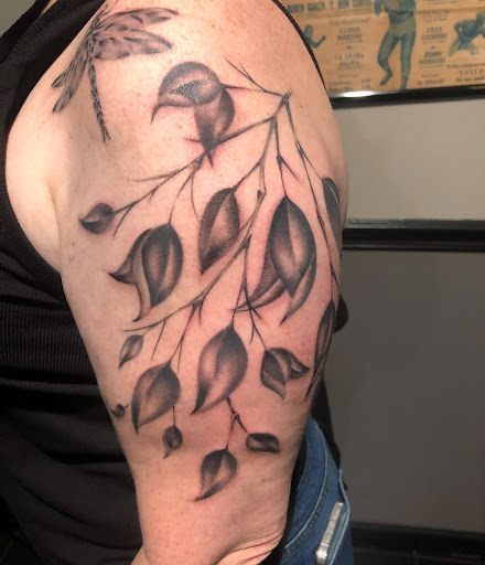 Explore women leg tattoo ideas, creative tattoo ideas in Webster, available at Mainline Ink