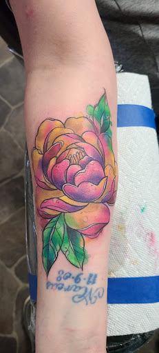 Explore tattoo flower ideas, creative tattoo ideas in Stetsonville, available at Solace Ink Company LLC