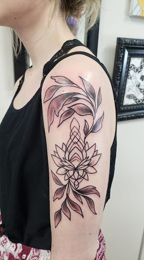 Explore ideas for small tattoos for guys, creative tattoo ideas in Flint, available at Black Eye Social Club Tattoo