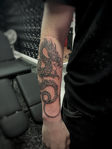 Explore best christian tattoo ideas, creative tattoo ideas in Fort Myers, available at Loyal 2 The Coil Tattoos & Piercings (Edison Mall Location Entrance F)