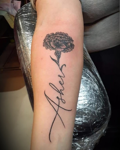 Explore patriotic forearm tattoo ideas, creative tattoo ideas in Lewes, available at Ancient Art Tattoo & Piercing Studio