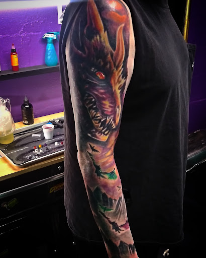 Explore tattoo ideas for top of leg, creative tattoo ideas in Mobile, available at Boujie Tattoo & Body Piercing