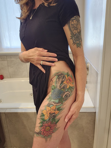 Explore butterfly and rose tattoo ideas, creative tattoo ideas in Elko, available at Iron Anchor Tattoo