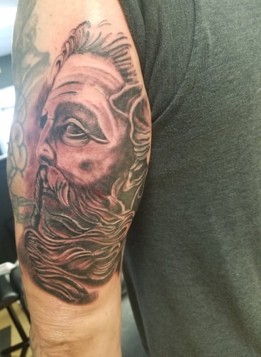 Explore ocean wave tattoo ideas, creative tattoo ideas in Sedalia, available at Skin Thieves Tattoo Studio