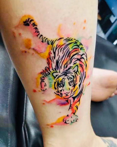 Explore tattoo ideas biker, creative tattoo ideas in Lake City, available at Crooked Spines Tattoo Studio