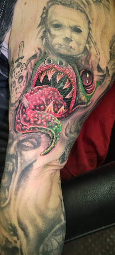 Explore finger word tattoos ideas, creative tattoo ideas in Angola, available at Hoodlum Ink