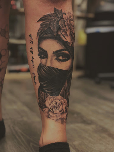 Explore street signs tattoo ideas, creative tattoo ideas in Graham, available at Transcendence Art Studio & Tattoo