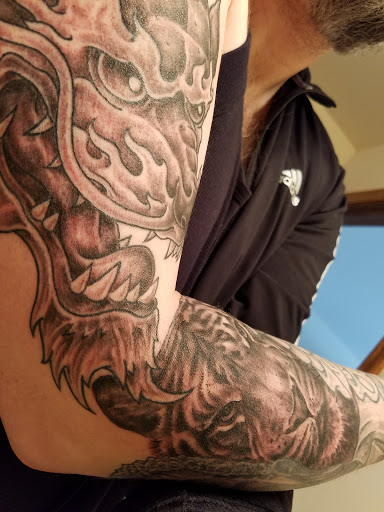 Explore chevy bowtie tattoo ideas, creative tattoo ideas in Waukesha, available at Waukesha Tattoo Company Galleria Edge