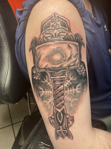 Explore construction worker tattoo ideas, creative tattoo ideas in Nashville, available at One Drop Ink Tattoo Parlour and Gallery